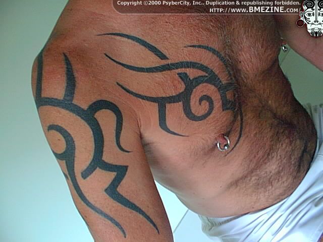 Tatuaże - Tattoo - Tribal Chest Arm.jpg